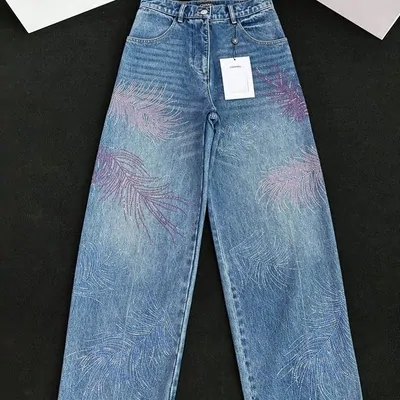 Jeans in the catalogue: Chanel Embroidered Feather Denim Jeans